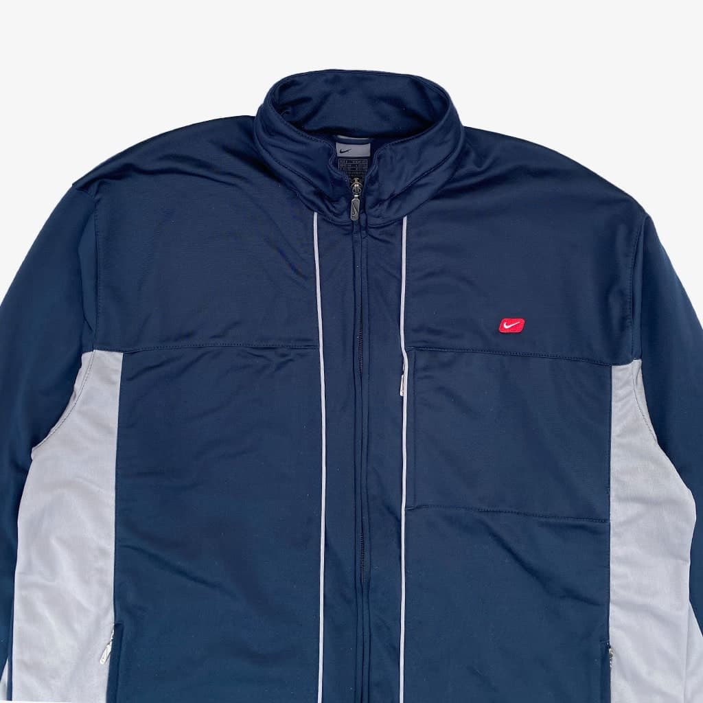 Nike Trainingsjacke 00s L in dunkelblau | Vintage Online Shop www.unique-resale.com