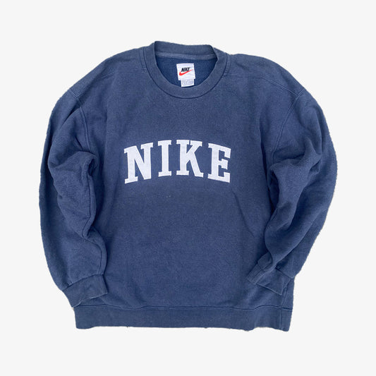 Vintage Nike Pullover Spellout 90s L in dunkelblau | Vintage Online Shop Unique-Resale
