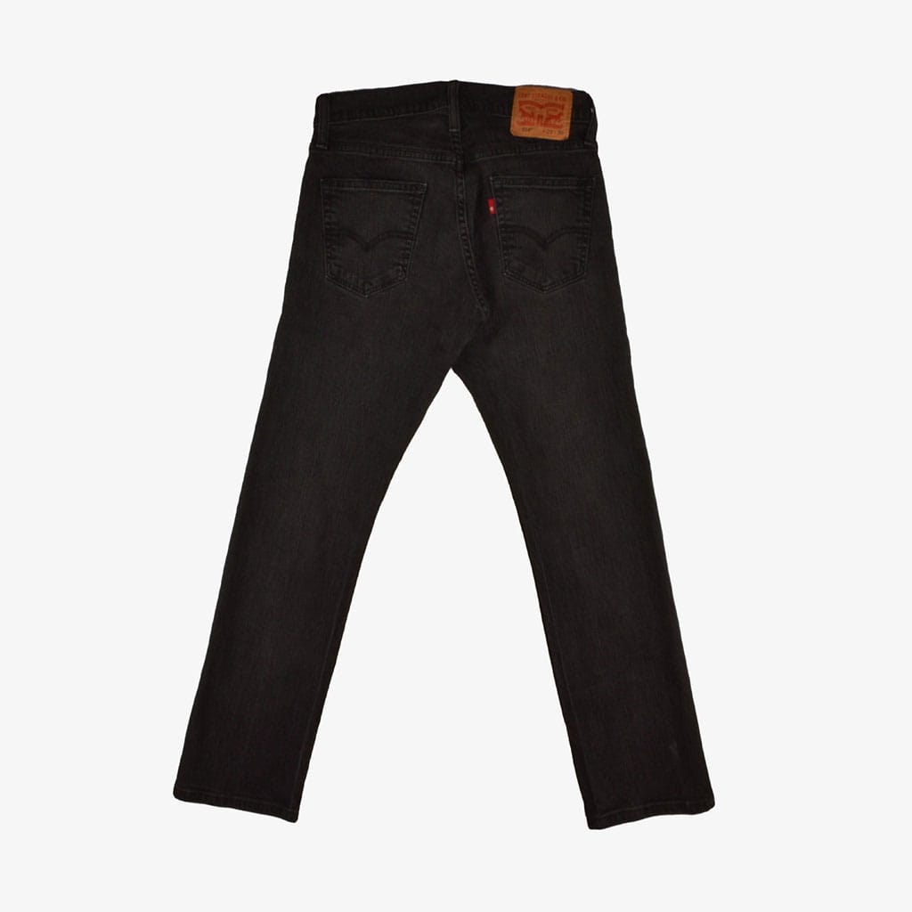 Vintage Levis Jeans 514 W29/L30 in schwarz flach liegend