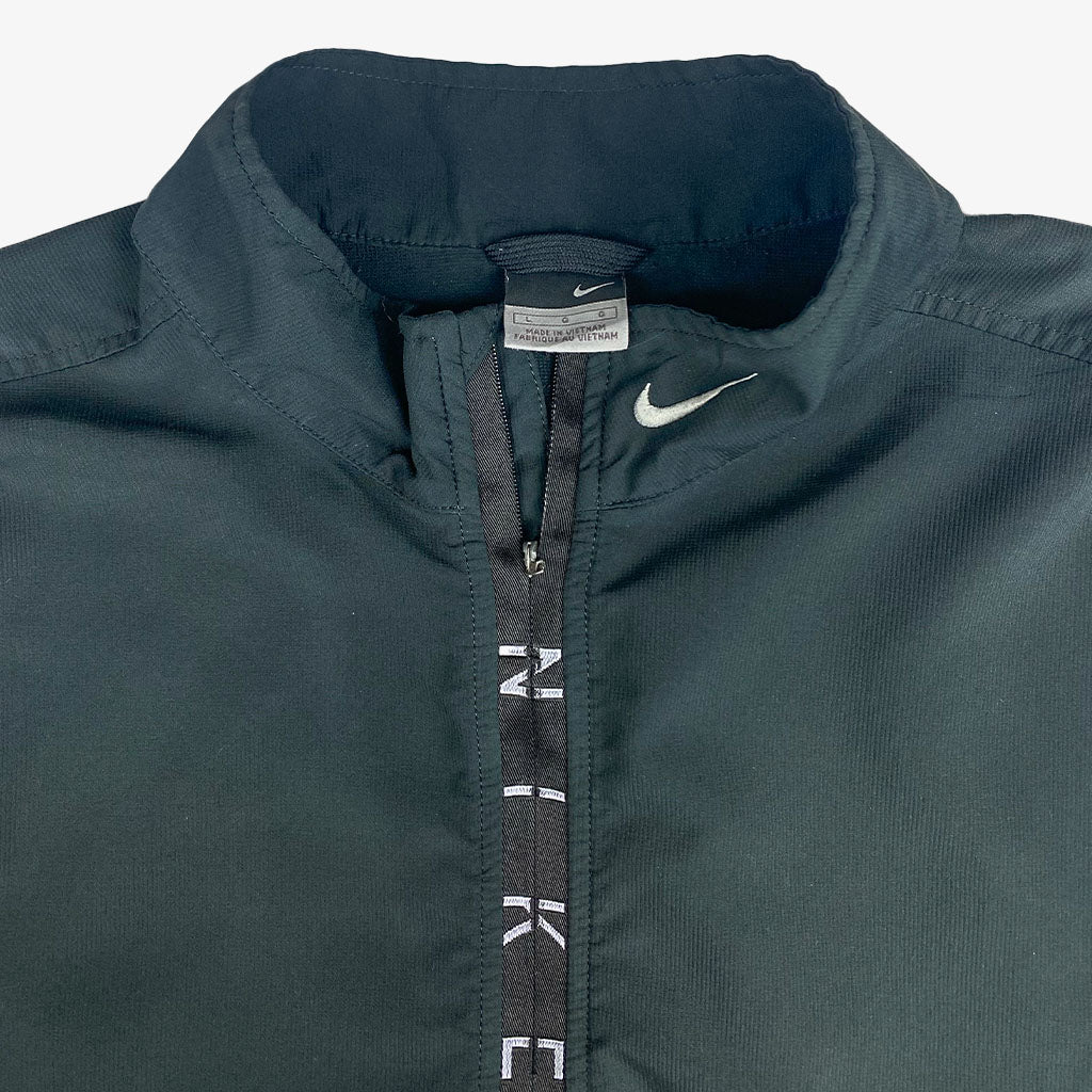 Vintage Nike 1/3 Zip Spellout Pullover 00s L in schwarz | Vintage Online Shop Unique-Resale 