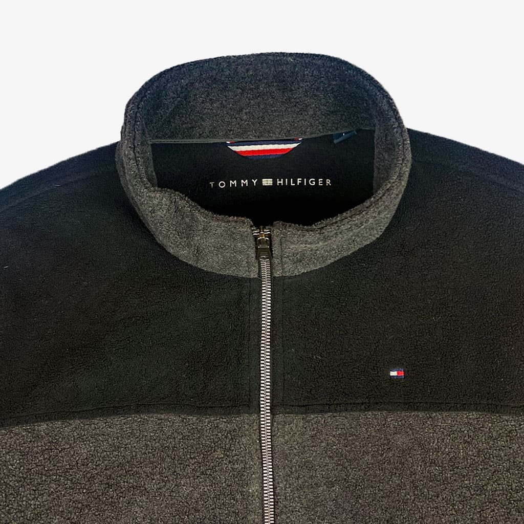 Vintage Tommy Hilfiger Fleece Jacke L in grau/schwarz | Vintage Online Shop Unique-Resale 