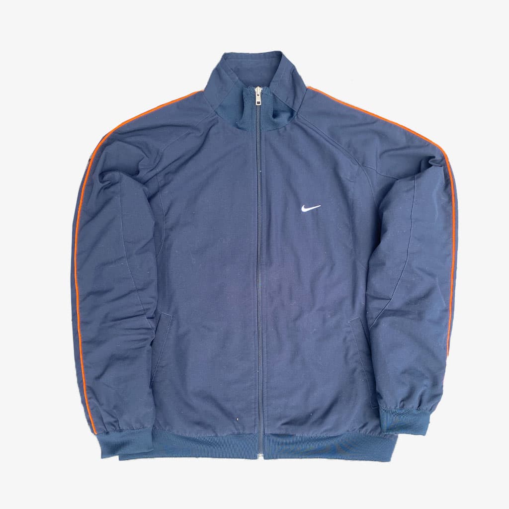 Vintage Nike Athletic Dept Trainingsjacke M in dunkelblau. | Vintage Online Shop Unique-Resale 