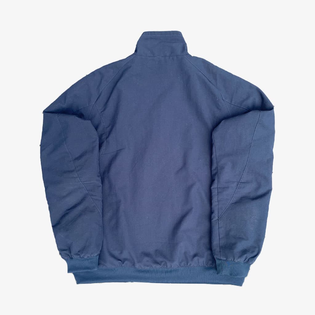 Vintage Nike Athletic Dept Trainingsjacke M in dunkelblau. | Vintage Online Shop Unique-Resale 